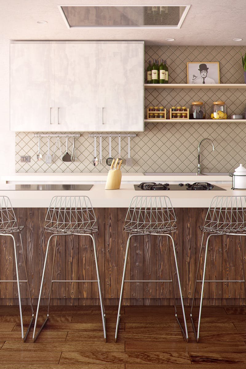 Chic minimalist kitchen design featuring wooden accents and modern bar stools.